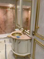 curved basin with marble vanity top
