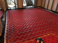 Red piping system layout for underfloor heating system