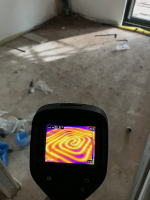 Digital gauge showing pressure test of underfloor heating